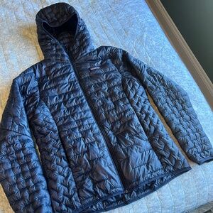 Patagonia women’s micro puff hoodie in size medium.